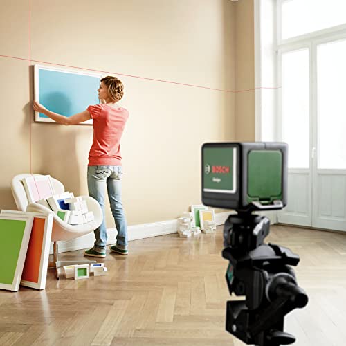Bosch Kreuzlinienlaser Quigo Plus mit Stativ (einfaches Ausrichten in gleichen und variablen Abständen dank Markierungen auf der Laserlinie)